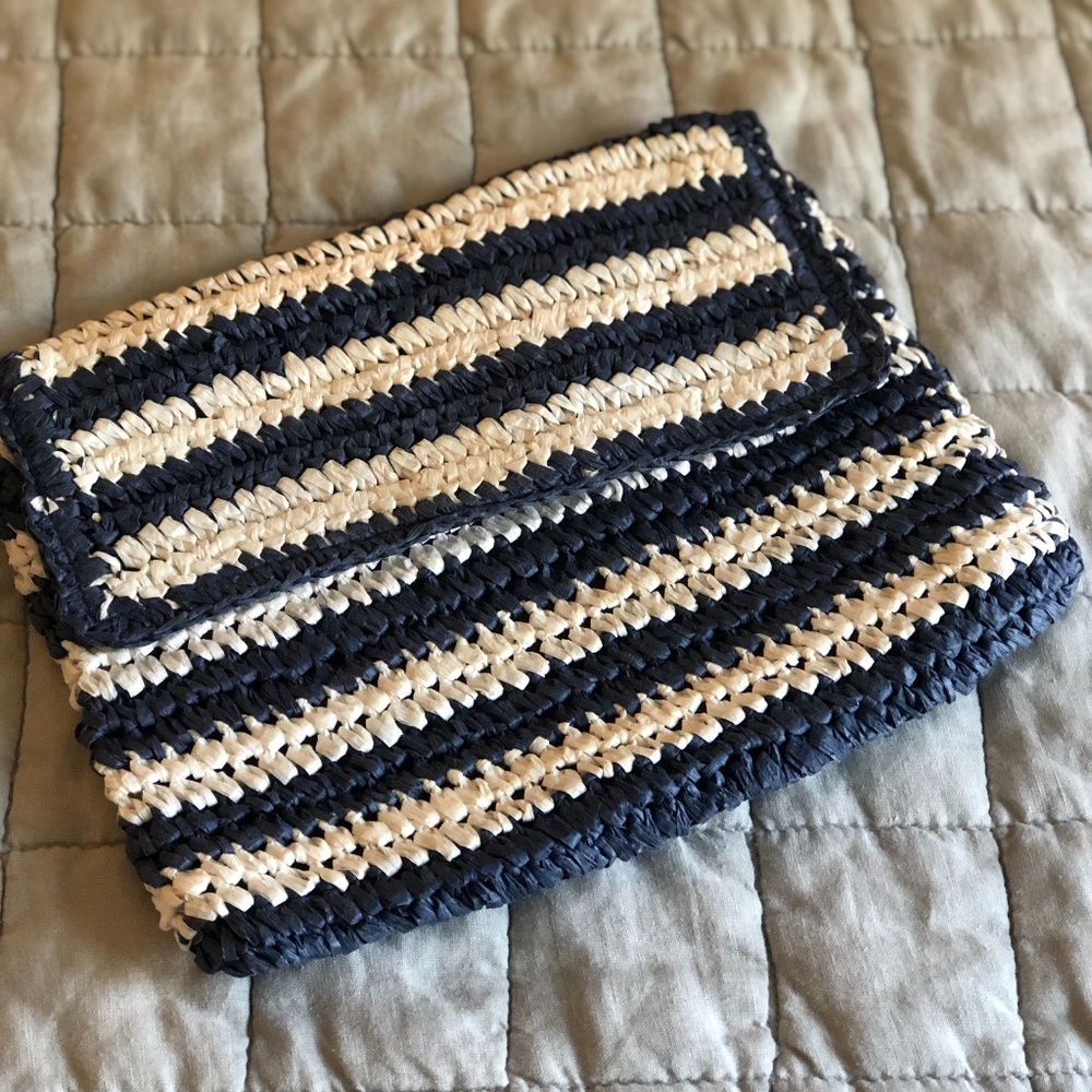 Striped woven clutch